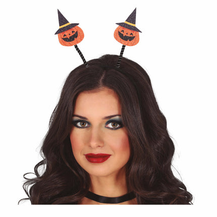 Bandeau d'Halloween avec citrouilles et chapeau