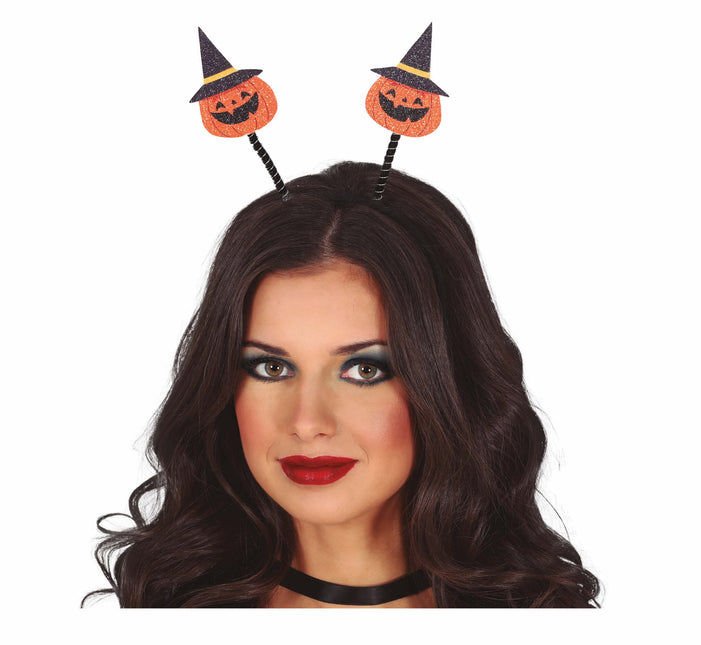 Bandeau d'Halloween avec citrouilles et chapeau