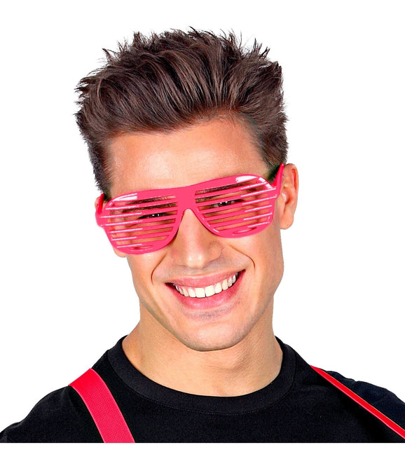 Lunettes rayées rose fluo